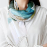Women Scarf with watercolored circles design.
